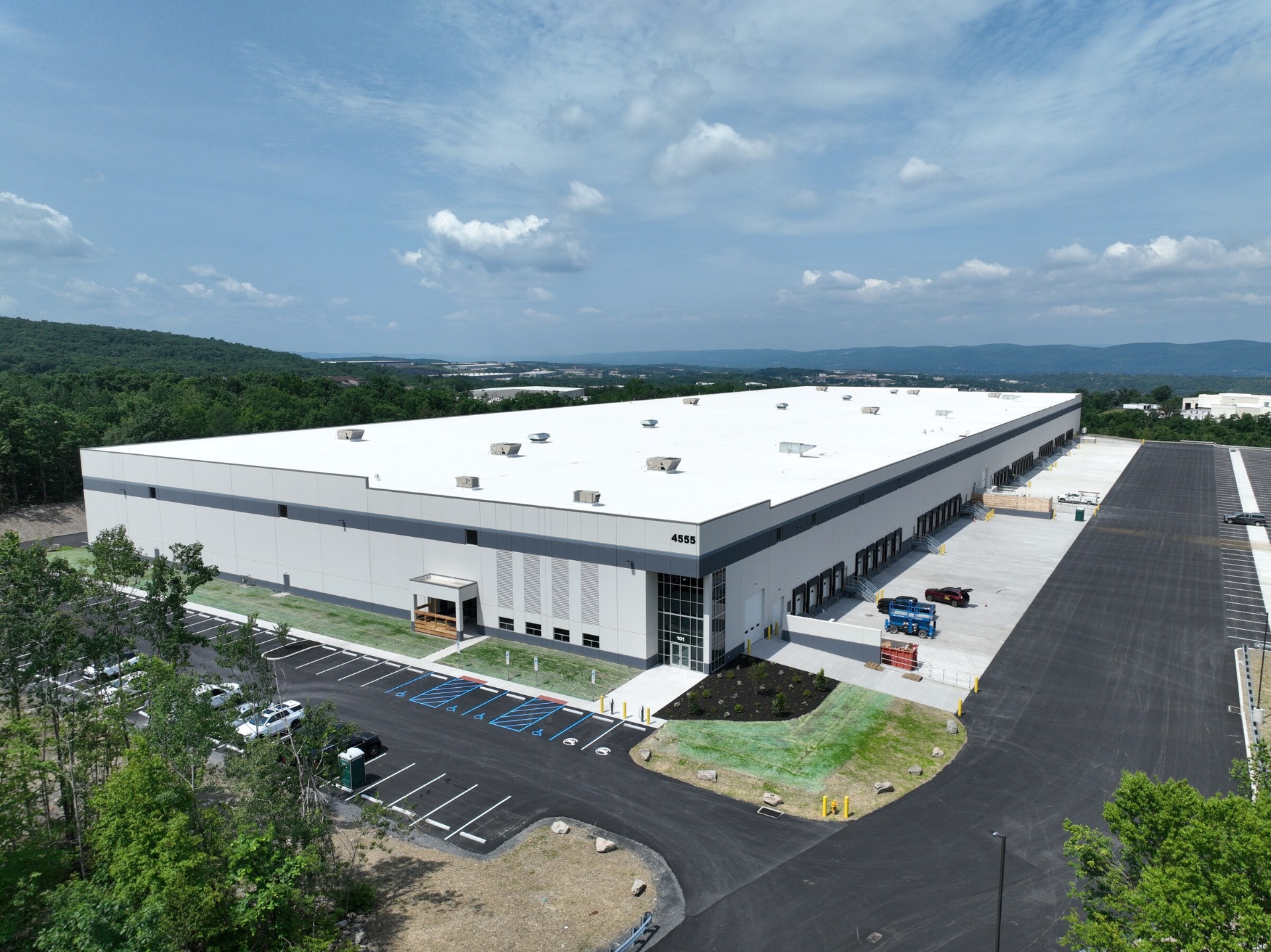 Aerial view of the completed 4555 Oldfield Boulevard, front entrance and parking