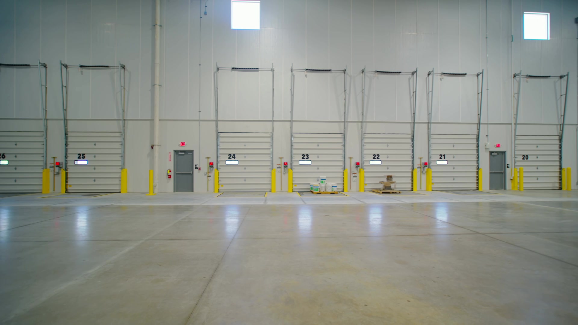 Suite 102 dock doors with levelers and bumpers, ready for trailers